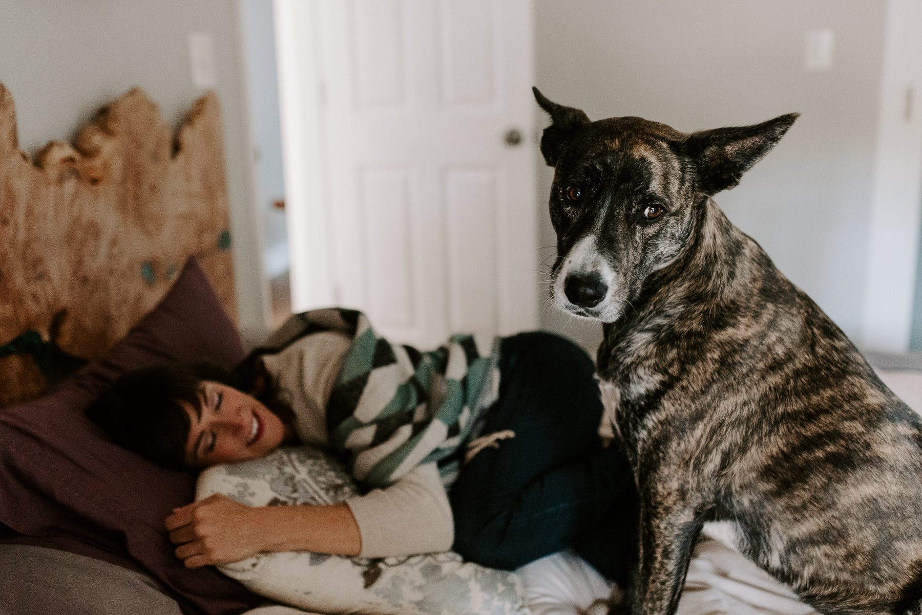 Carrie Wren and her dog relaxing after a life coaching session in Charlotte, NC